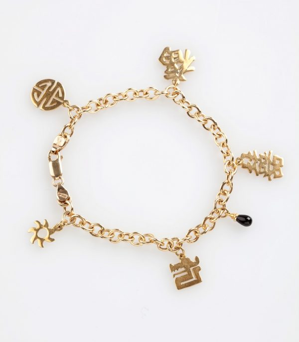 Gold chain bracelet with gold charms