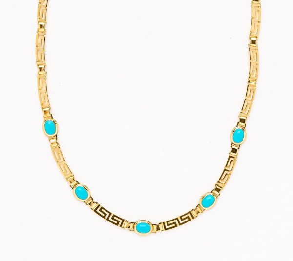 Gold necklace with the greek design