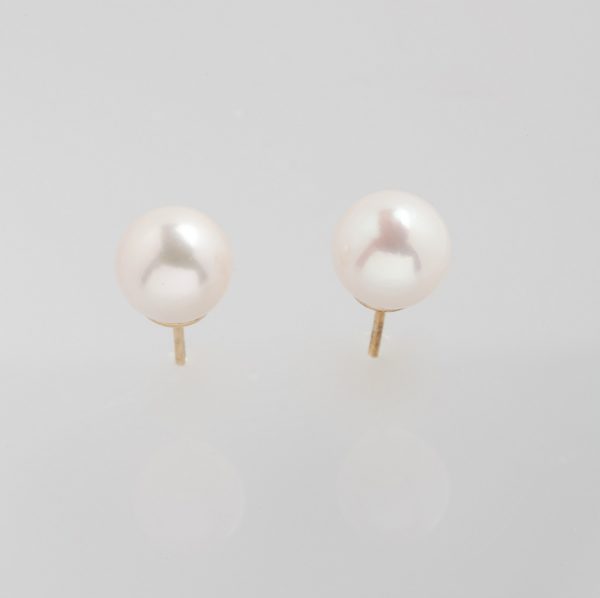 Gold earrings with real pearls