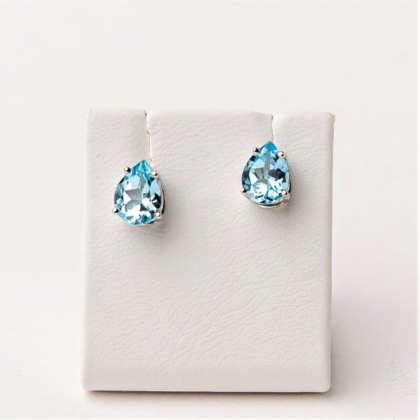 White gold earrings with blue topaz