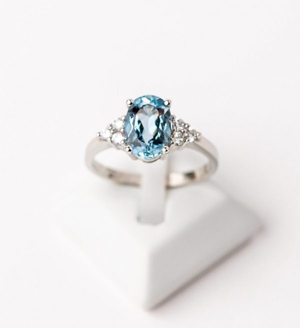 White gold ring with blue topaz